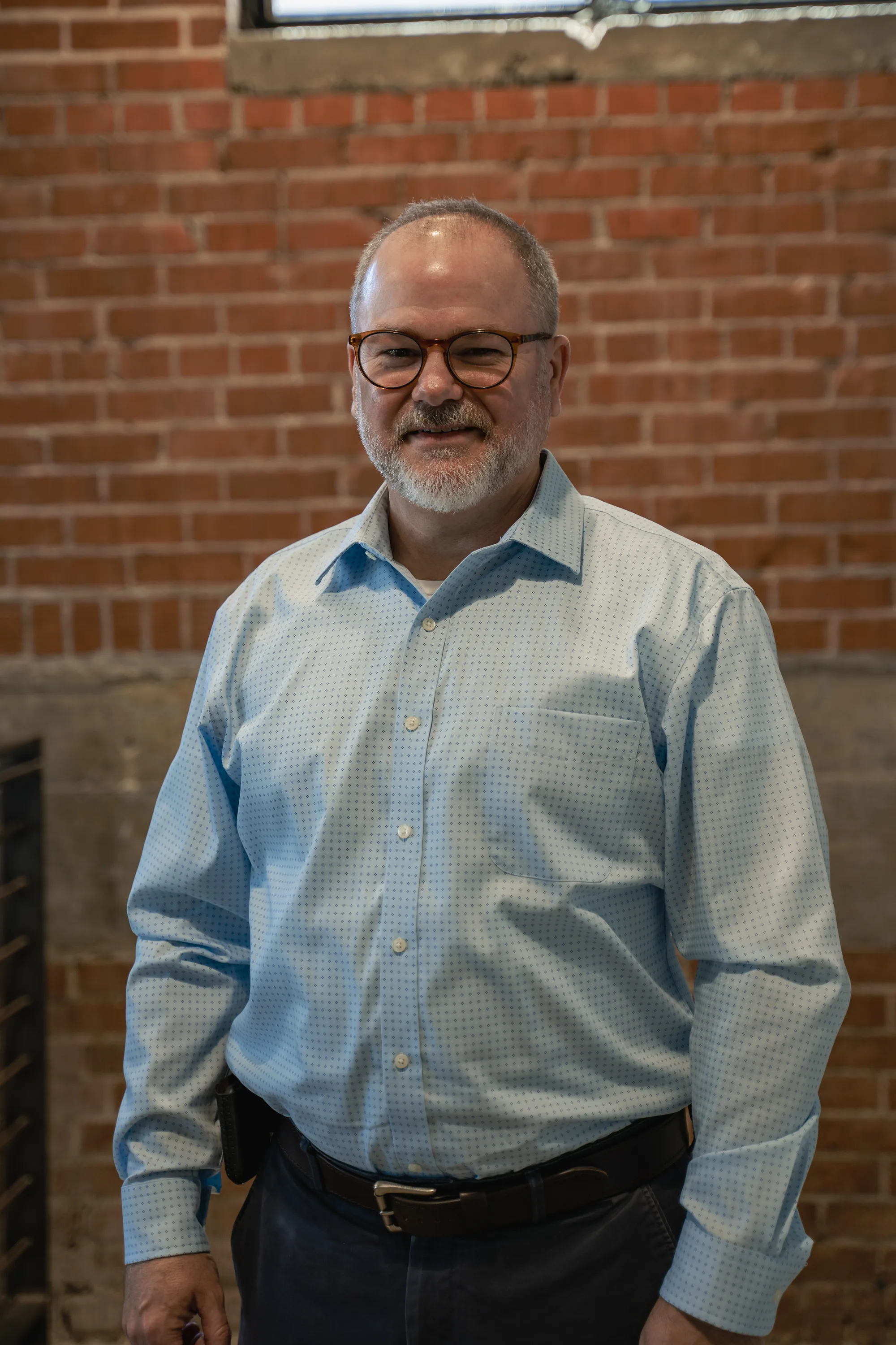 The StrongerWork founder who takes these calls, at the Tempe office.